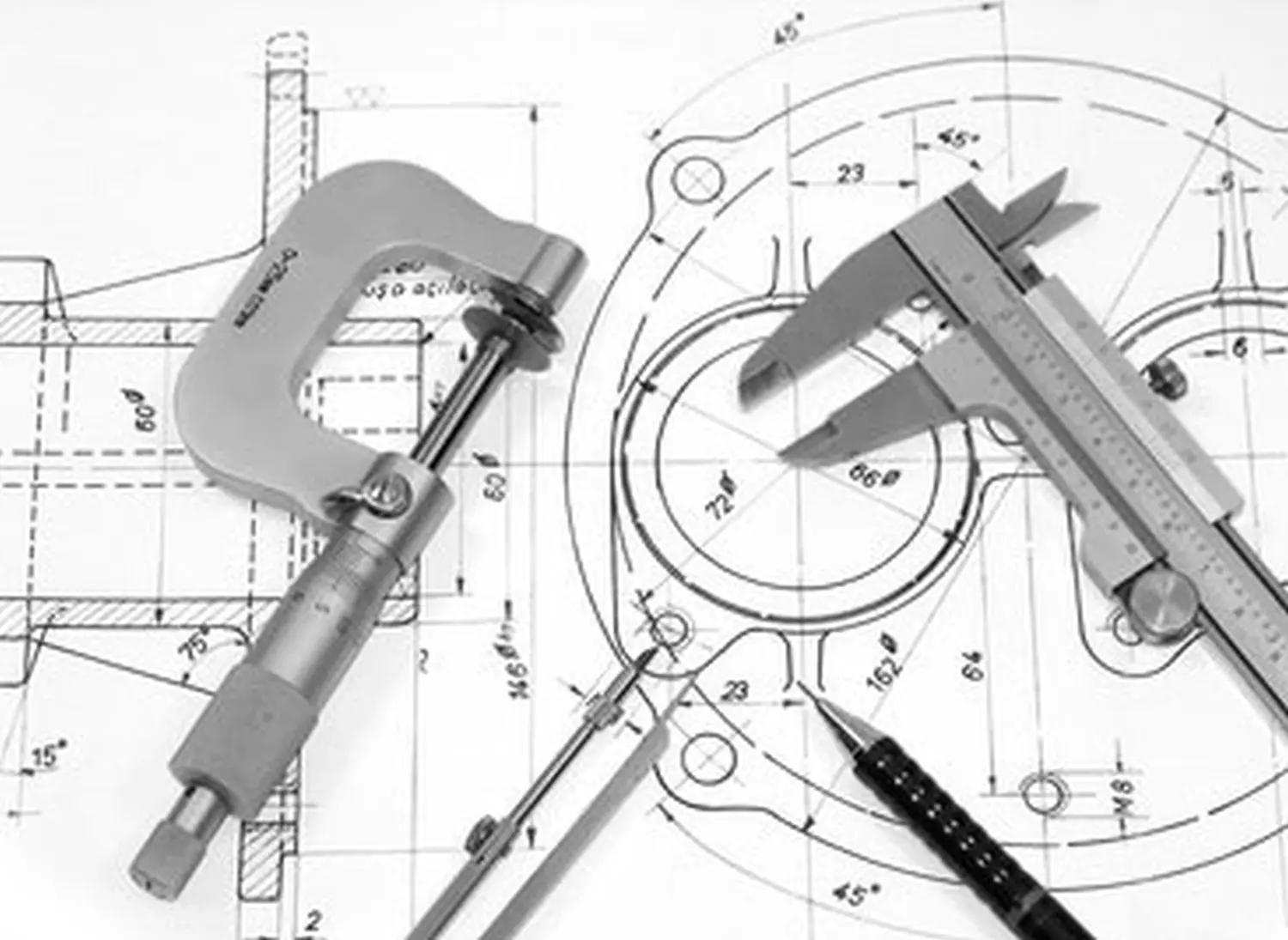 Mikrometerzirkel und Lineal auf technischen Zeichnungen von PLS GmbH - Dengler